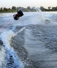 Picture of Roy Moranz knee boarding flip in the Missouri River.