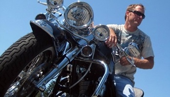 Picture of Roy Moranz on Harley Davidson Road King Motorcycle.