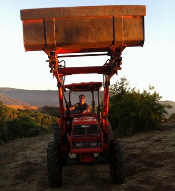 Picture of Roy Moranz on tractor.